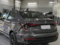 Fiat Cronos con golpe trasero izquierdo